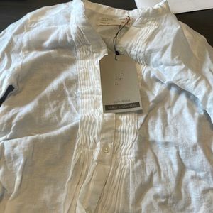 New with tags but minor stain not noticeable.